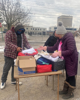 Brianna Cobb volunteered her time with friends at Lighthouse Ministries to hand out a collection of items for those experiencing homelessness