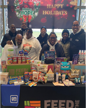 Members of the MacLellan team spent the morning packing and distributing food and household items to over 800 families in Detroit.